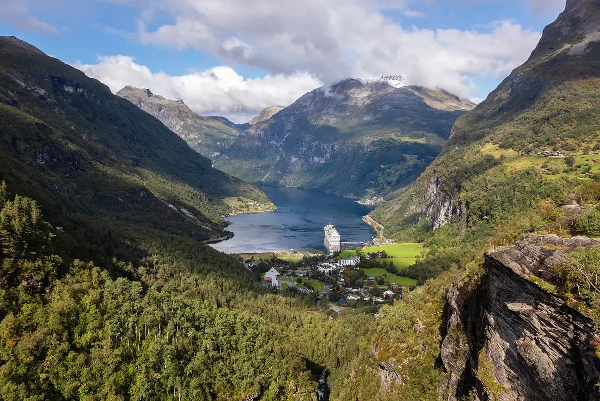 A cruise ship in Geirangerfjord, Norway, seen from the mountains